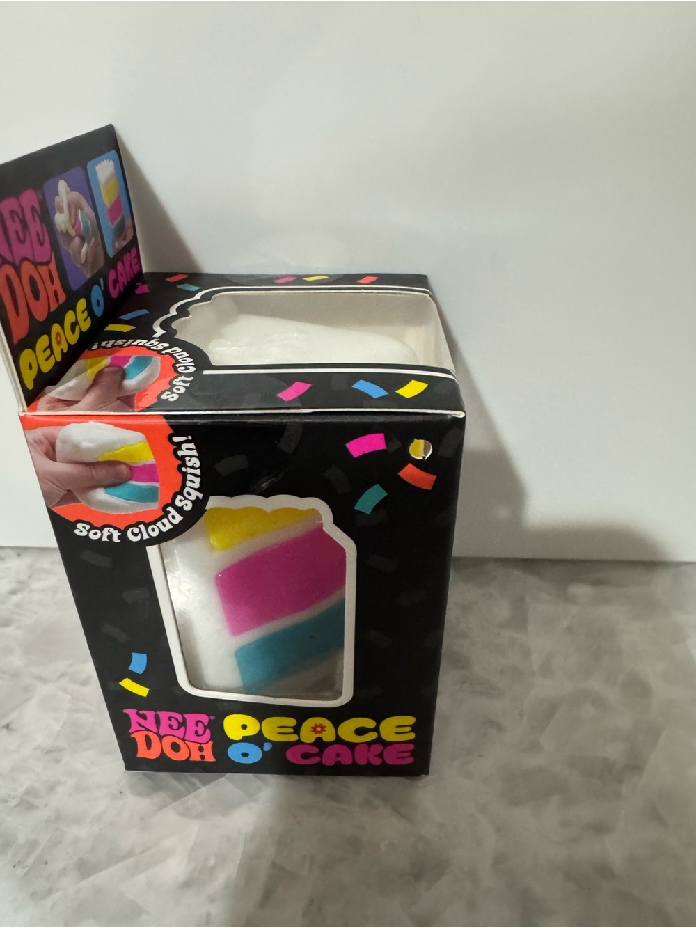 Nee Doh Peace O' Cake Squeeze Toy - White, Yellow, Pink, Blue - Picture 4 of 6